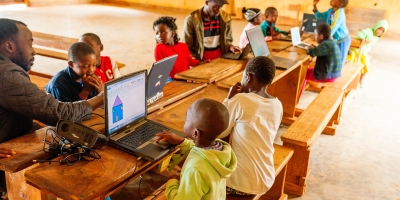 School children with computers in Africa